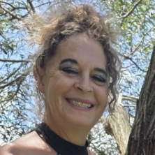 Rob and Ree from Robberee Acoustic Duo posing with their instruments